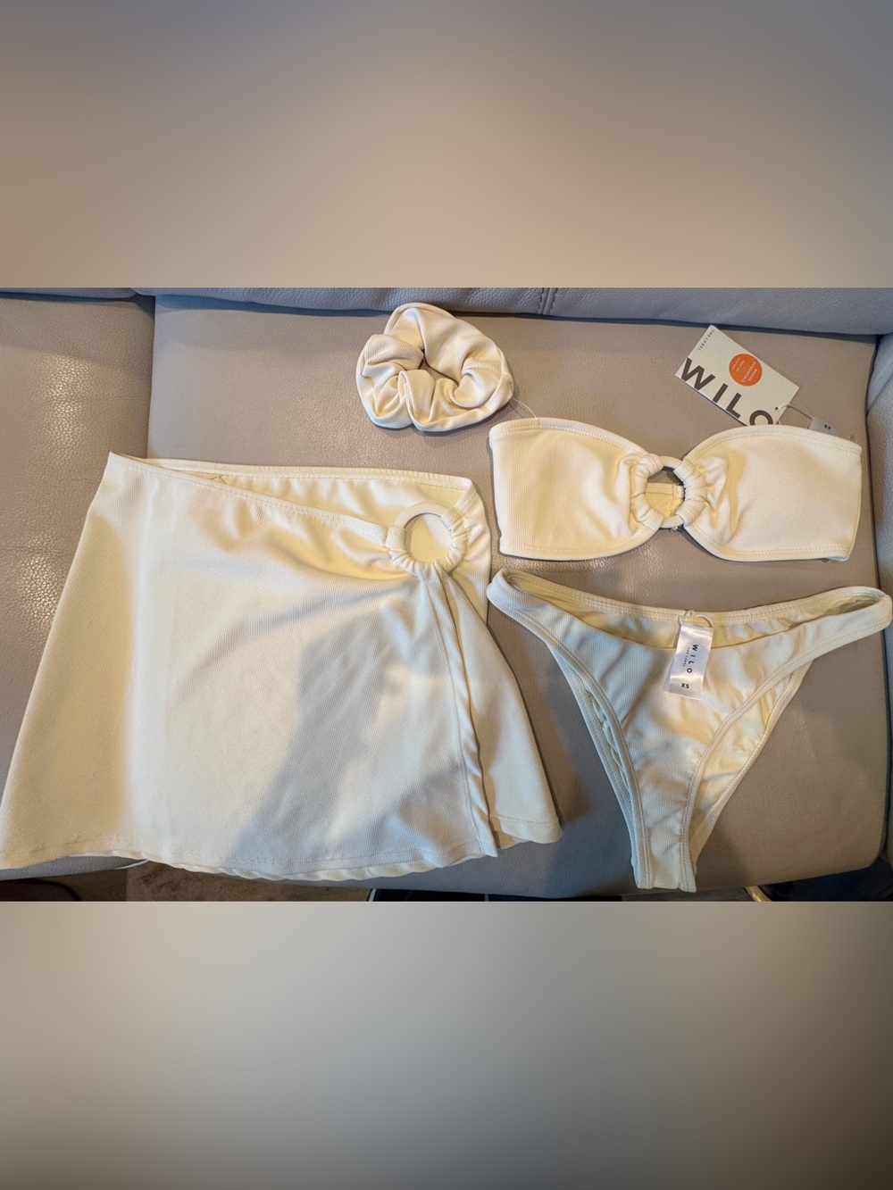 Cream Ring-Accent Bandeau Bikini Set with sarong skirt and hair tie